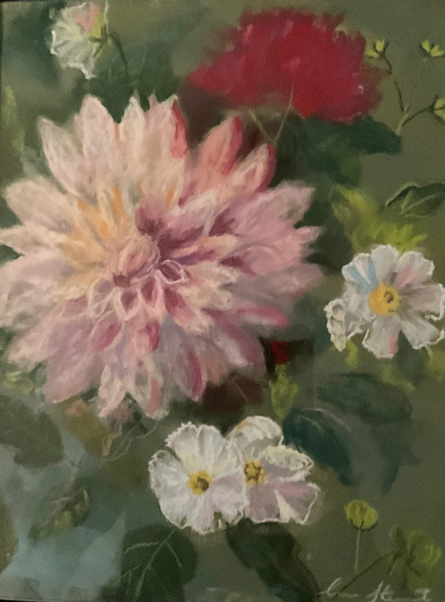 Large pale pink dahlia with a red rose and small white flowers against deep green foliage